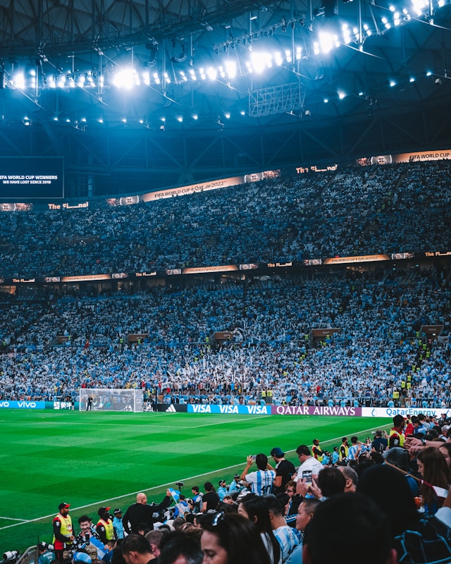 A photo of a stand filled with Argentina fans at the 2022 World Cup supporting their team.